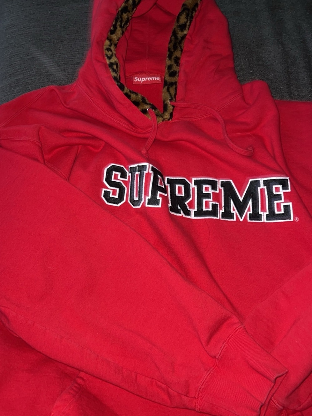 Supreme Red Hoodie with Leopard Faux-Fur Trim